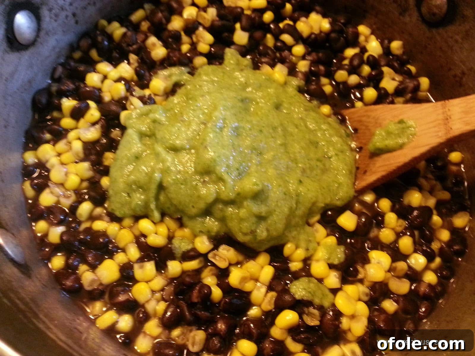 Freshly blended aromatic spices added to the corn and beans
