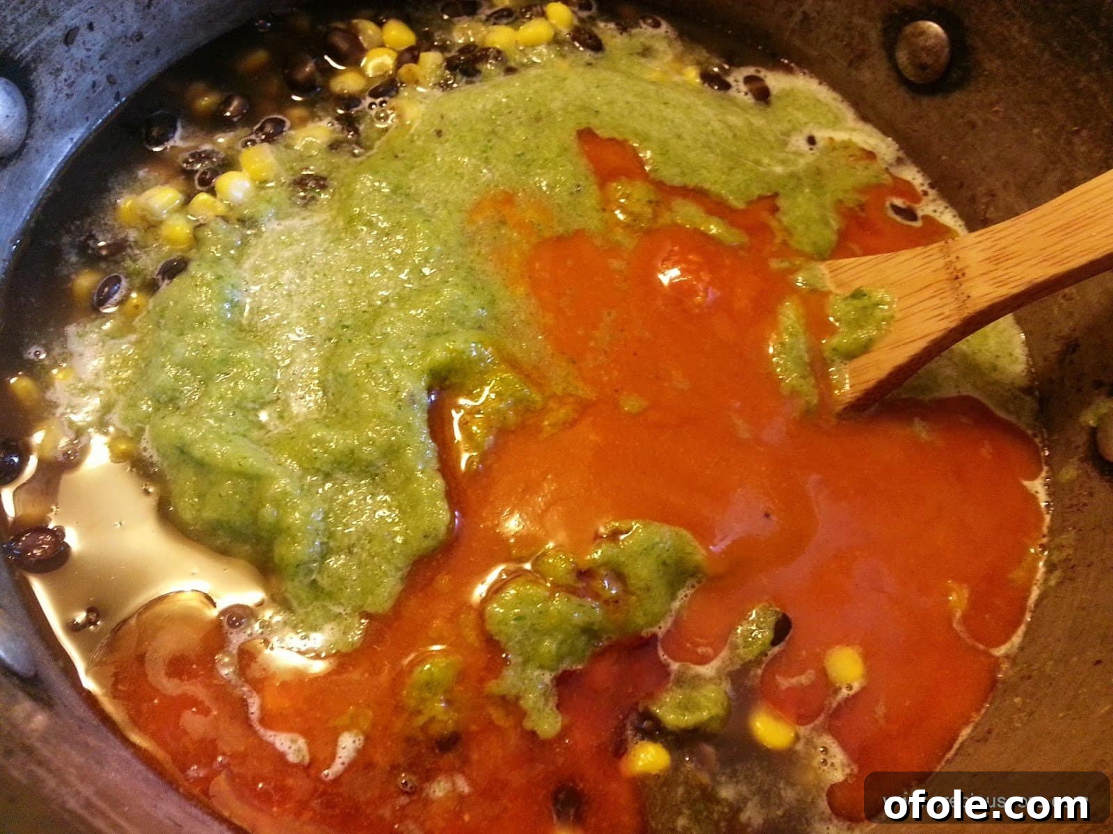 Palm oil, seasonings, and crayfish added to the Corn Chaff