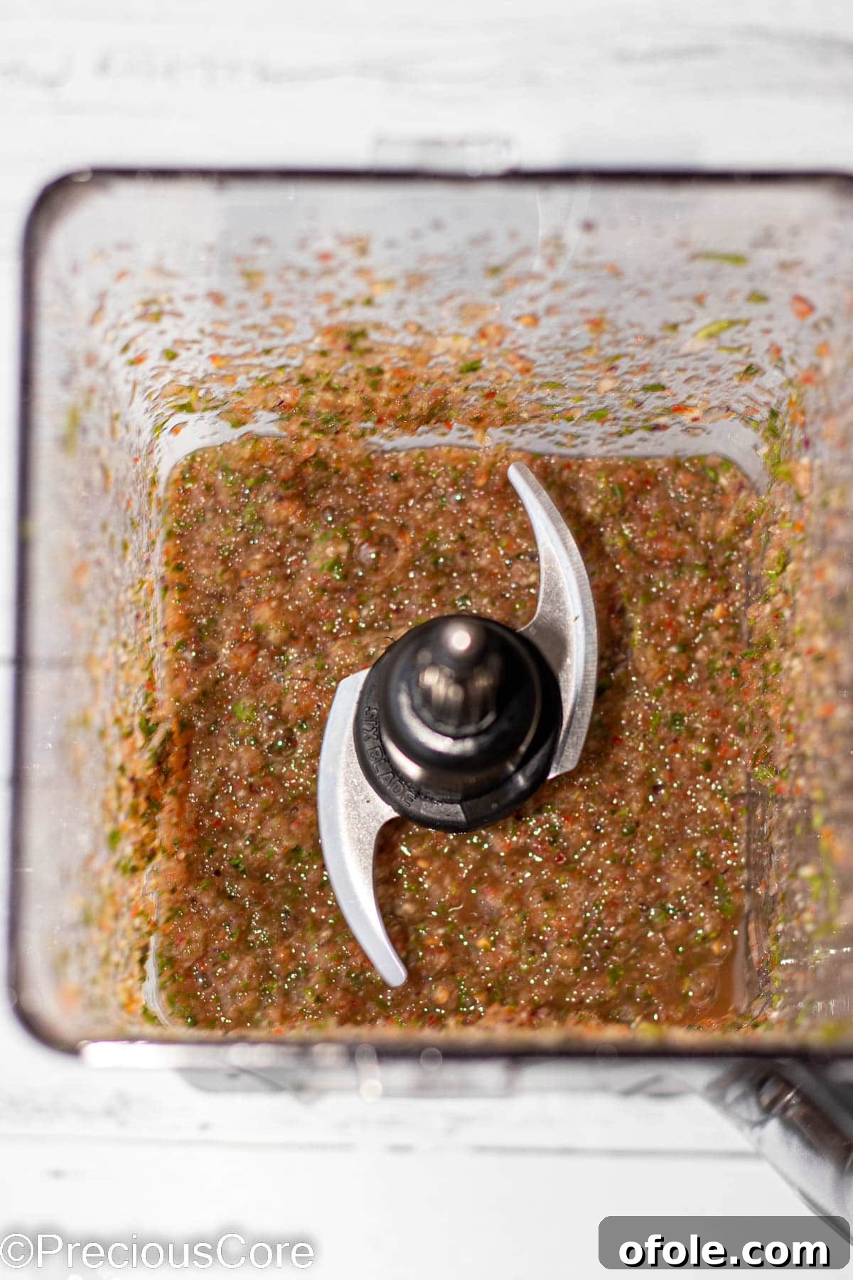 Pepper sauce ingredients blended in a blender.