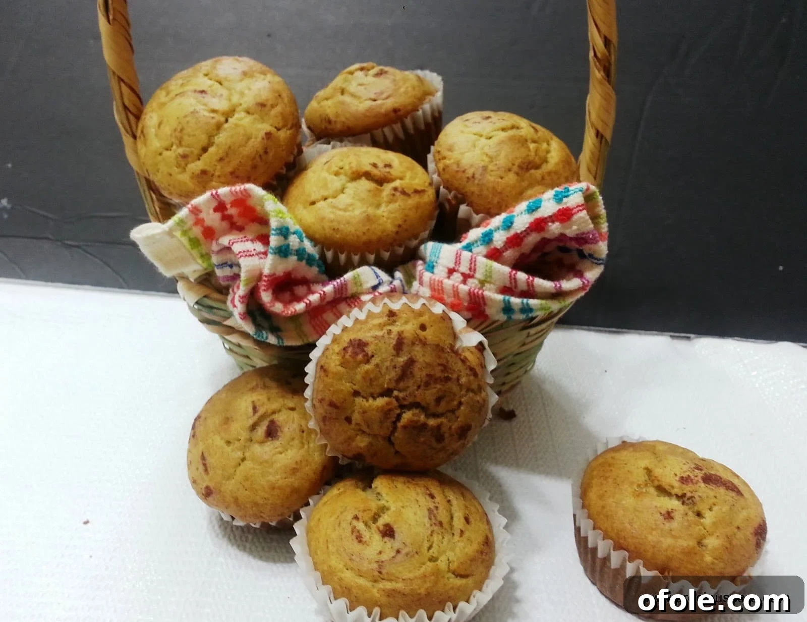 Basket of traditional Cameroonian banana cakes, golden brown and inviting.