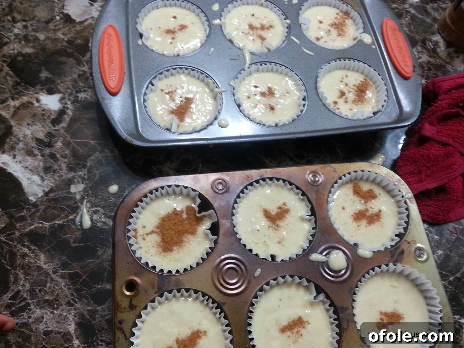 Banana cake batter topped with cinnamon powder.
