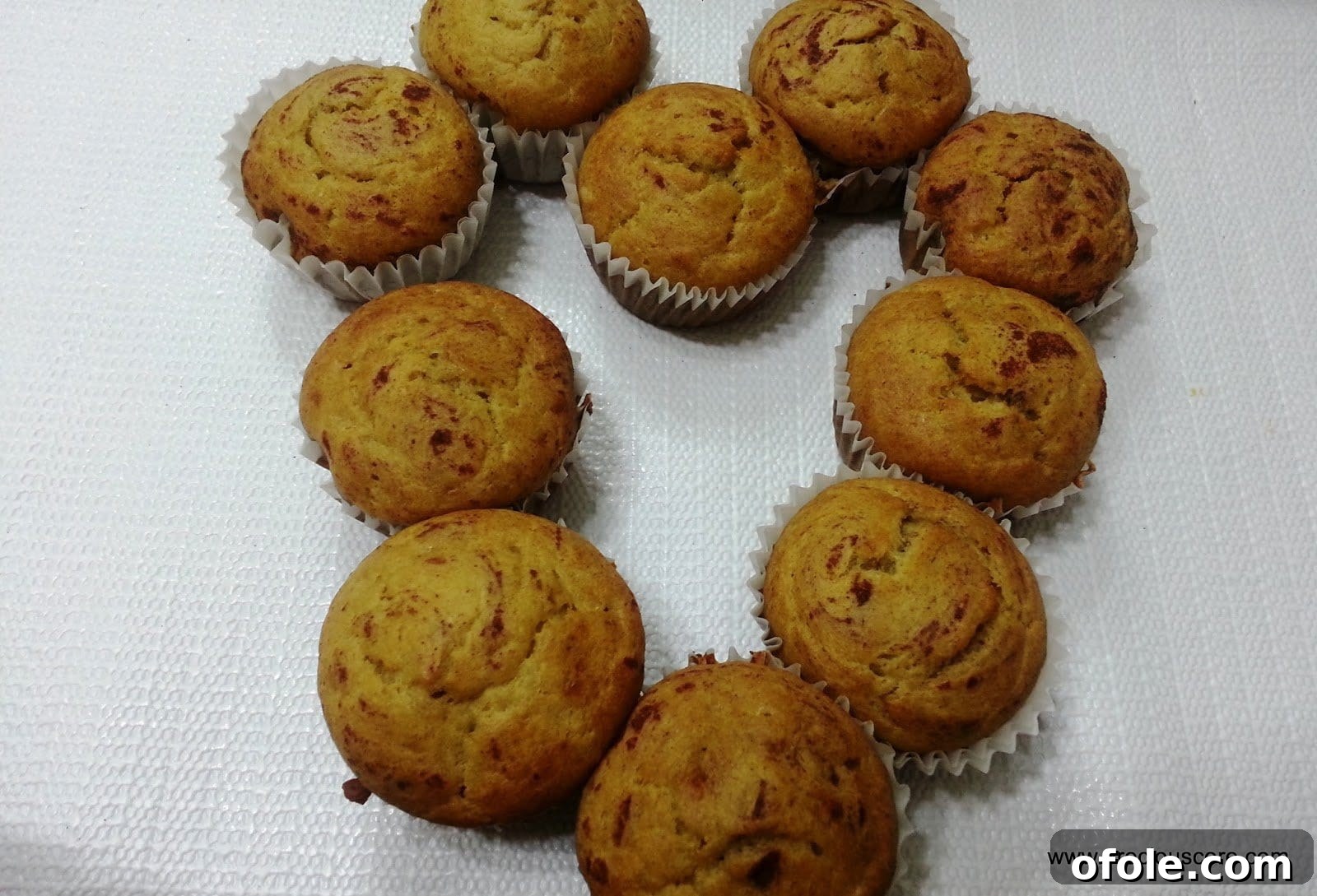 Heart-shaped Cameroonian banana cakes, showcasing creativity.