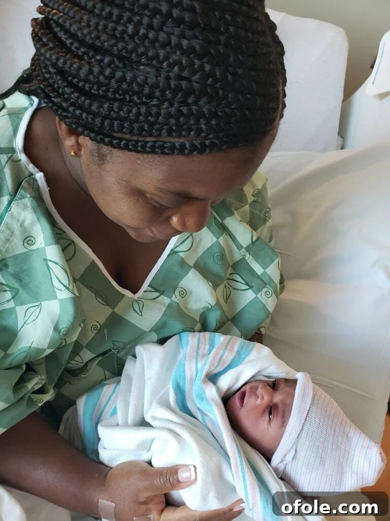 Introducing Our Little Miracle 3 Tender Moment: Mother Cuddling Her New Baby Daughter