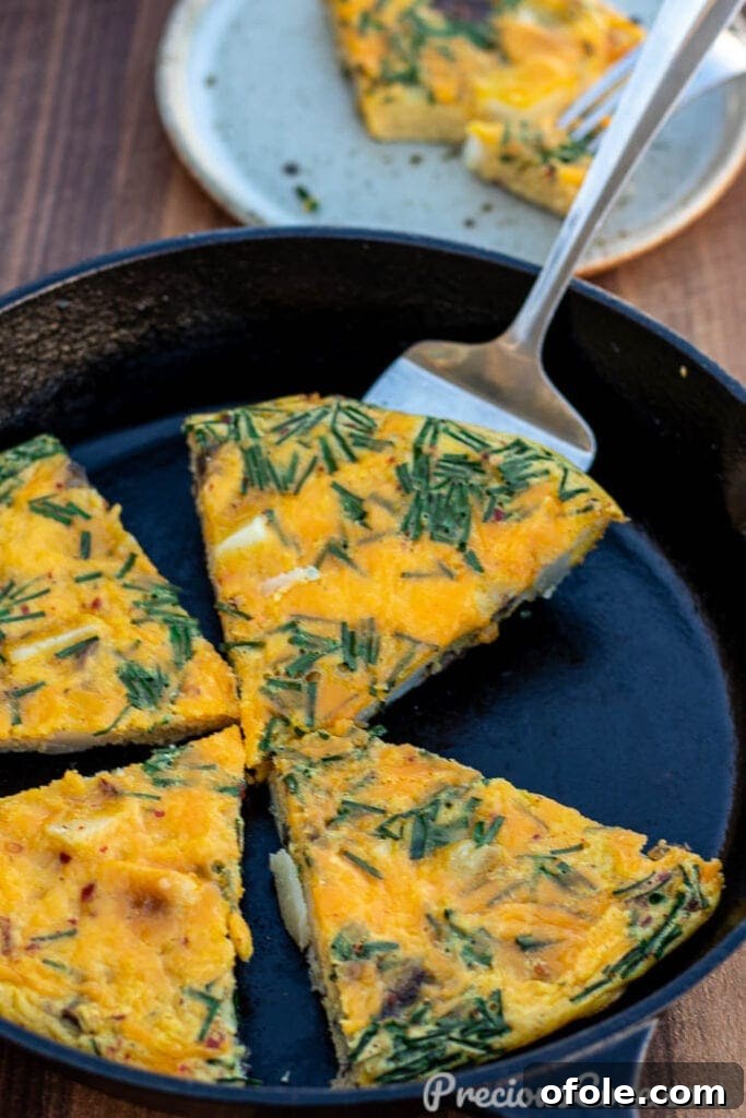 Rustic Potato Frittata 2 Slices of Potato Frittata in skillet