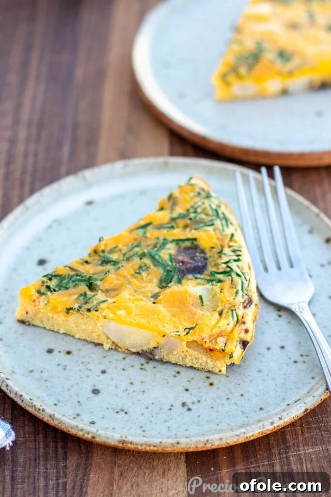 Rustic Potato Frittata 3 Slice of potato frittata on a plate