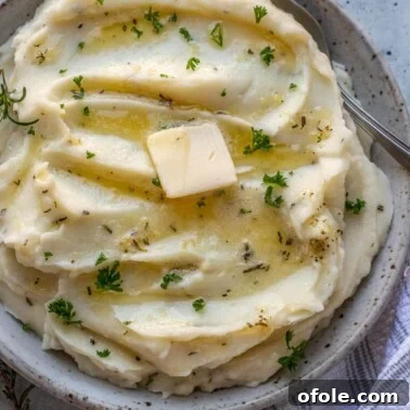 Square image of rosemary garlic mashed potatoes.