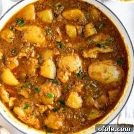 Discover Africa: 20 Irresistible Dinner Recipes 23 A bowl of fragrant Cape Malay Chicken Curry, a savory South African dinner.