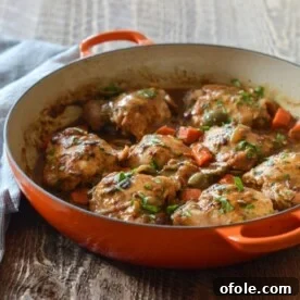 Discover Africa: 20 Irresistible Dinner Recipes 27 Moroccan Chicken Tagine, a rich chicken stew cooked in a cast iron braiser, perfect for an African dinner.