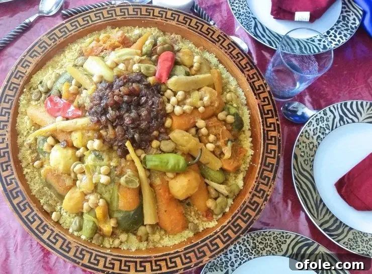 Discover Africa: 20 Irresistible Dinner Recipes 28 A dish of Moroccan Couscous with 7 Vegetables, a comforting North African dinner.
