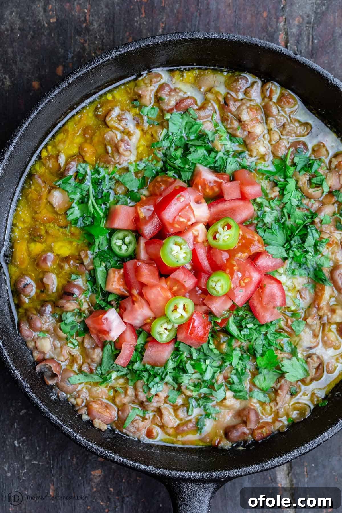 Discover Africa: 20 Irresistible Dinner Recipes 31 A bowl of Egyptian Fava Beans, known as Ful Medames, a hearty vegan African dinner.