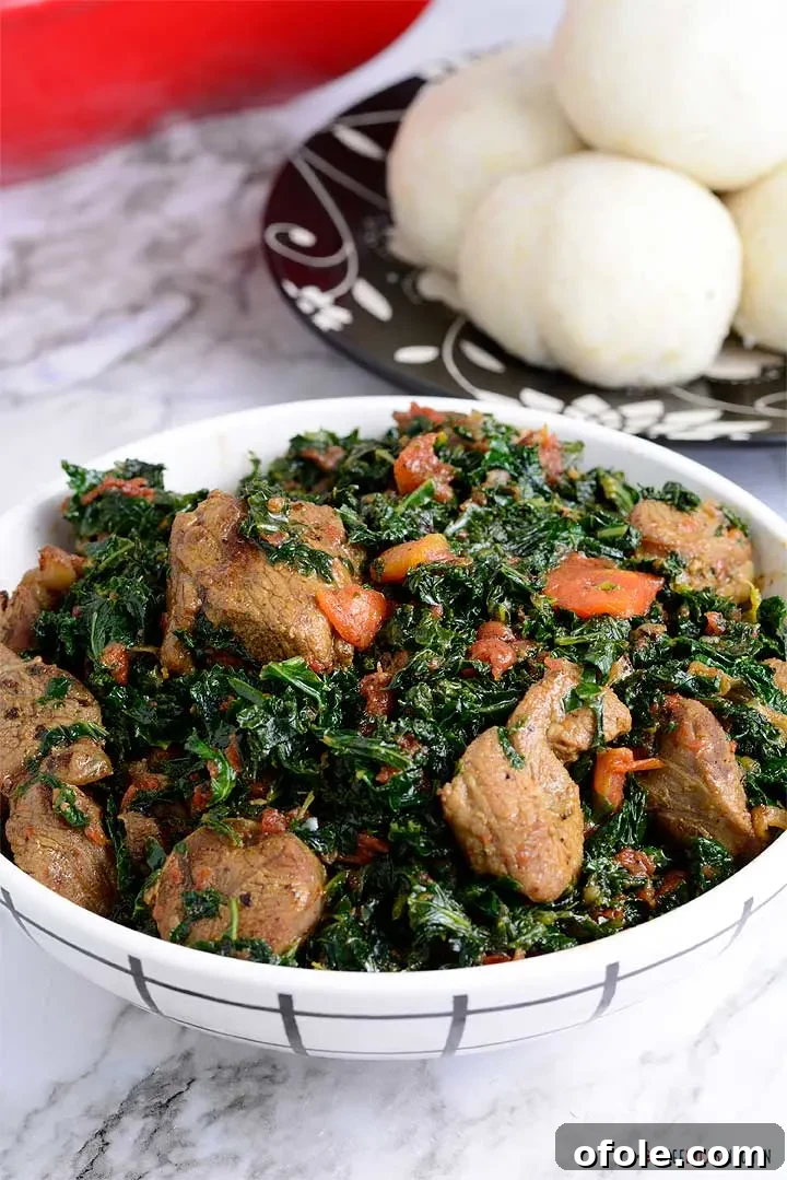 Discover Africa: 20 Irresistible Dinner Recipes 33 A dish of Sukuma Wiki, flavorful Kenyan braised collard greens, a healthy African dinner.