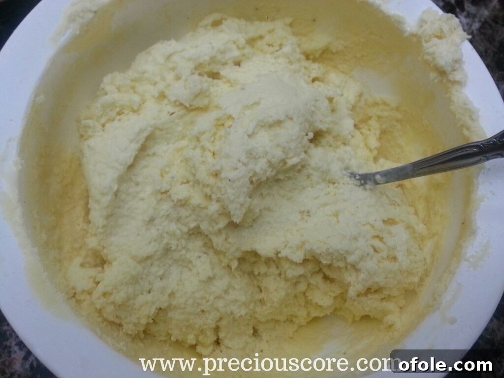 No-churn Key Lime Mint Ice Cream at a semi-frozen, creamy consistency