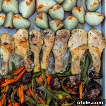 Roasted chicken, potatoes and veggies on a sheet pan, the final delicious meal.