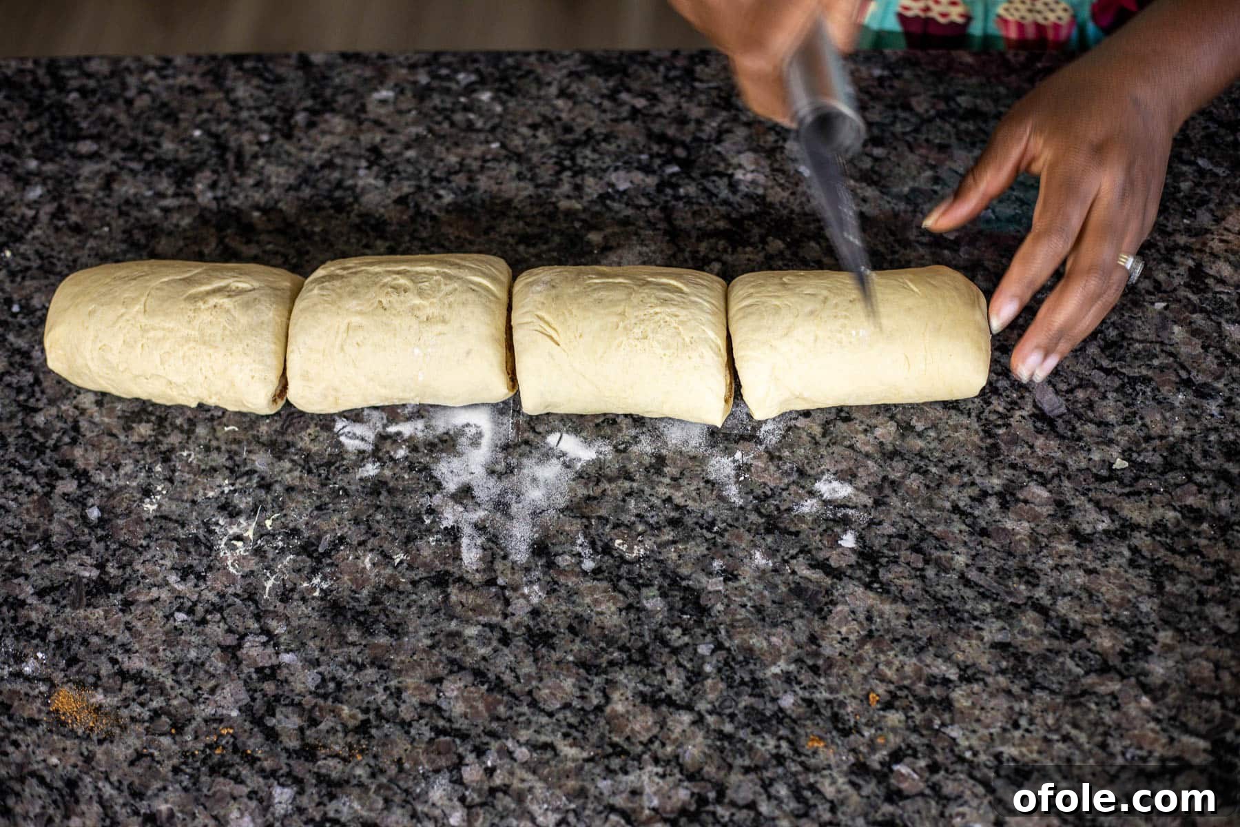Heavenly Cinnamon Swirls with Tangy Cream Cheese Glaze 13 Cinnamon roll log cut into 4 pieces.