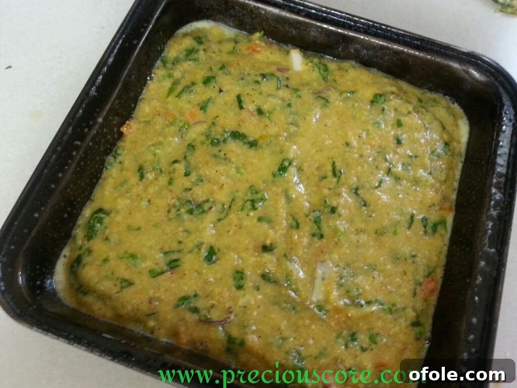 Unlock the Secret to Perfect Egg Cake 10 Egg cake mixture poured into a greased cake pan
