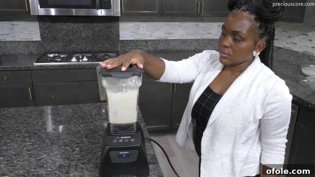 East Africa's Sweet Secret: Vitumbua Coconut Rice Pancakes 5 All Vitumbua ingredients being blended together in a high-powered blender to form a smooth batter.