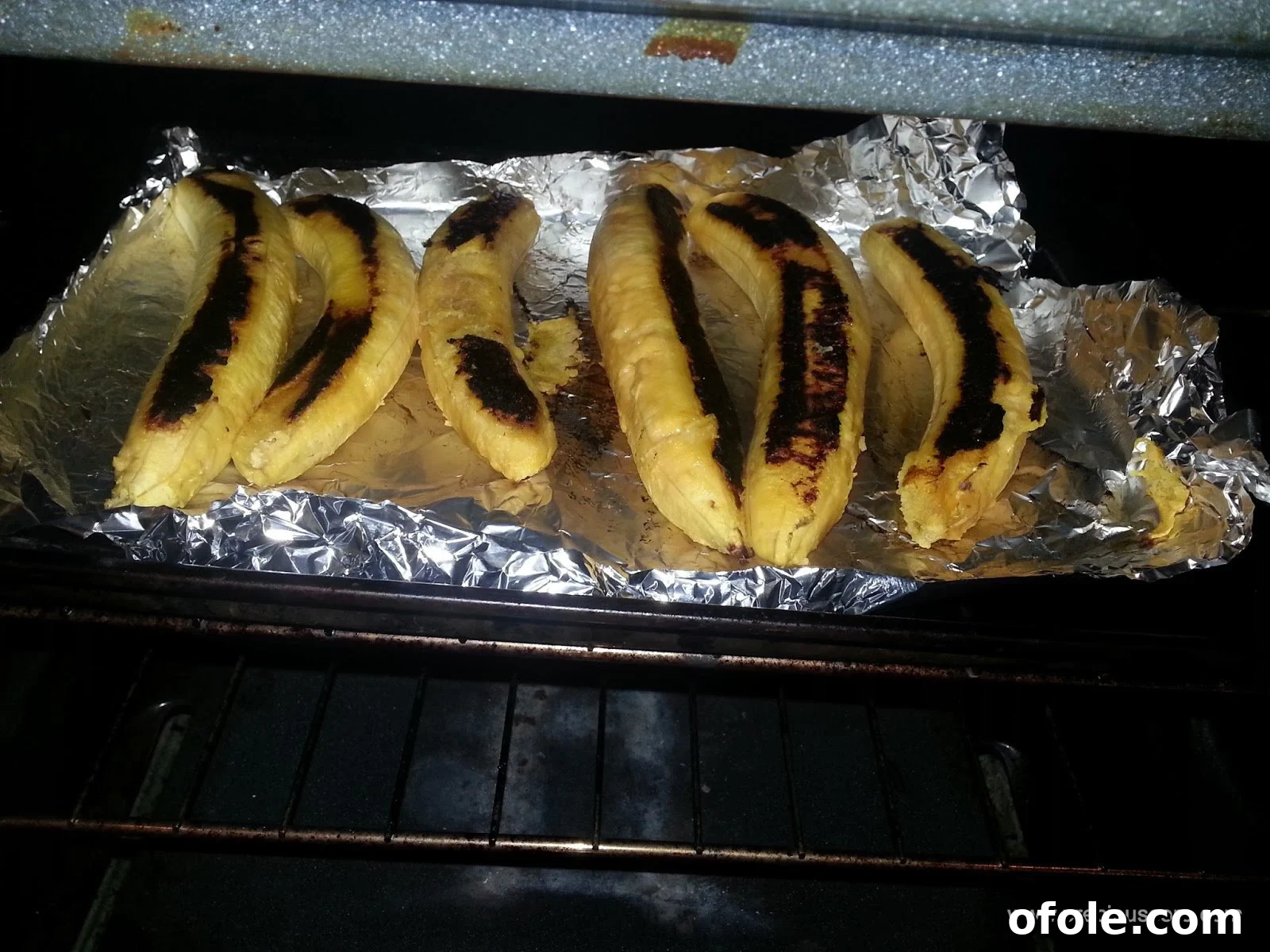 Plantain Boats: Unlock Your Creativity with Tropical Flavors 5 Roasted plantains starting to brown and soften on the baking tray