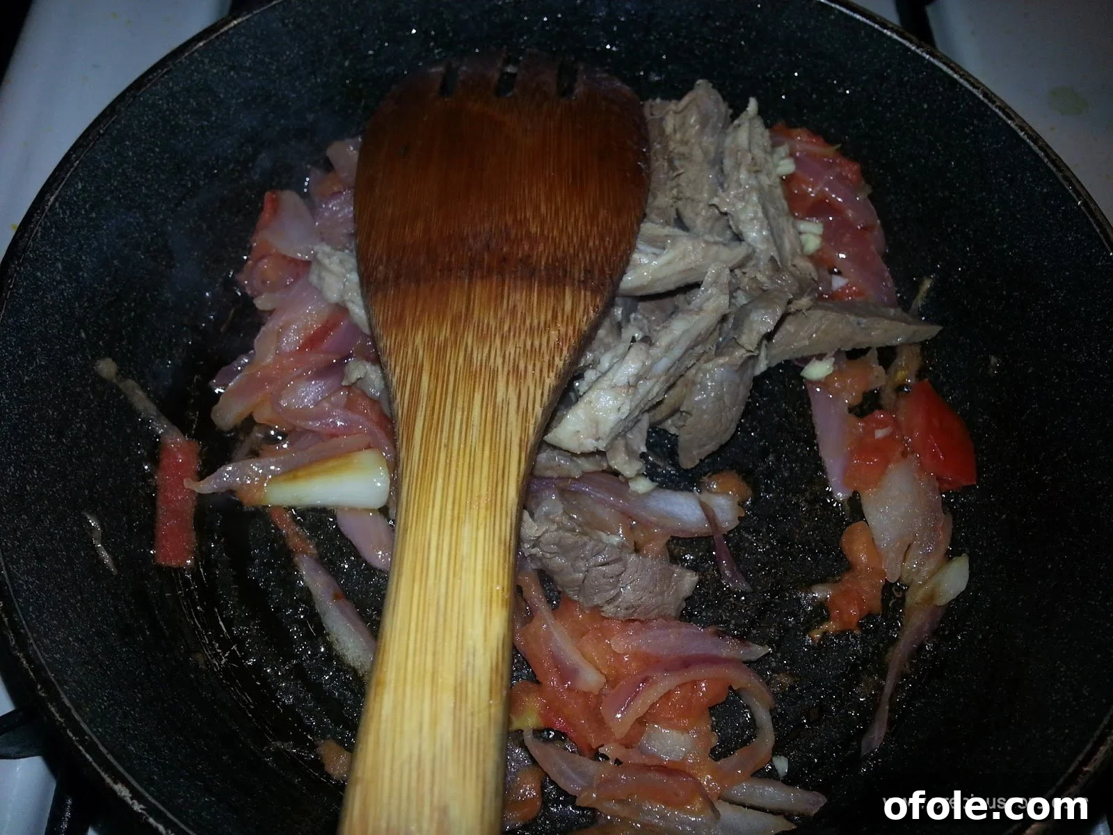 Plantain Boats: Unlock Your Creativity with Tropical Flavors 9 Closer view of the well-cooked, soft tomato and onion mixture
