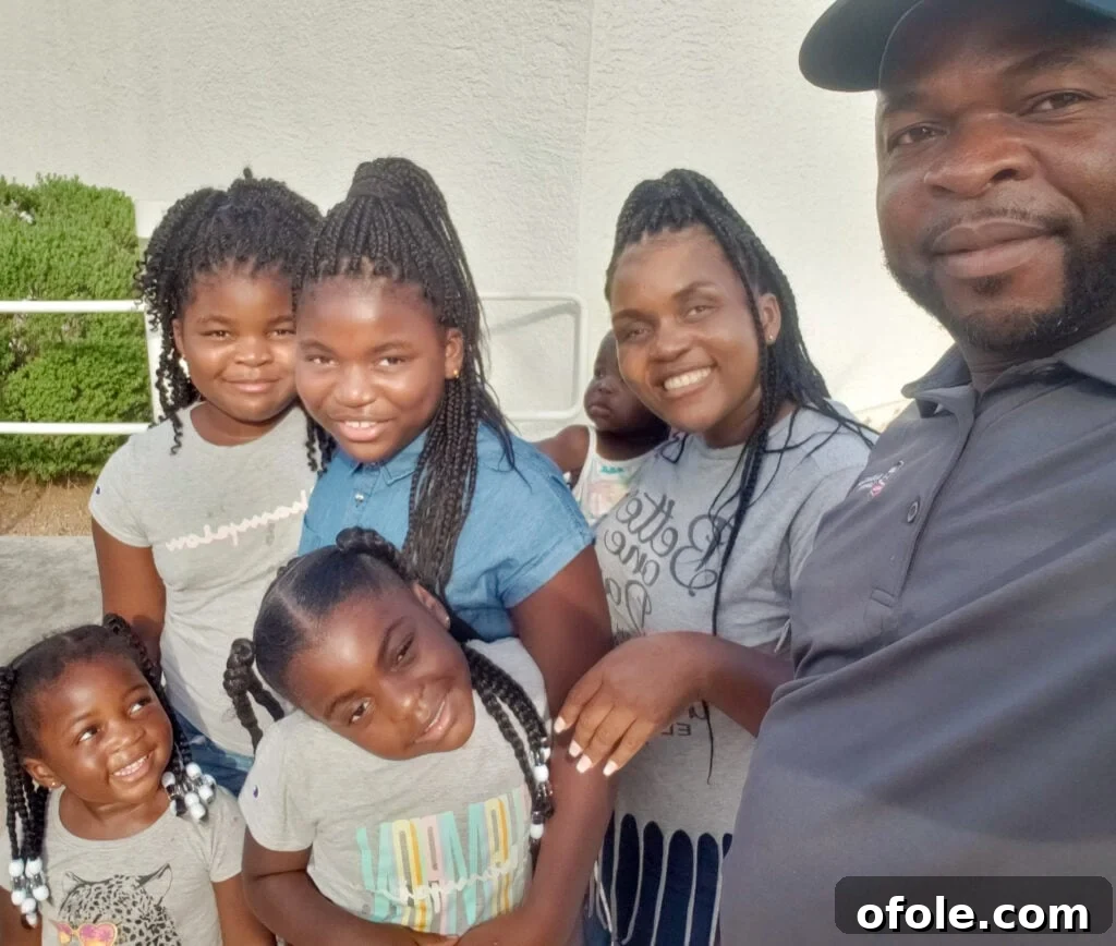 Havasu Haven: An Arizona Family Escape 2 Smiling Black family portrait with Lake Havasu in the background