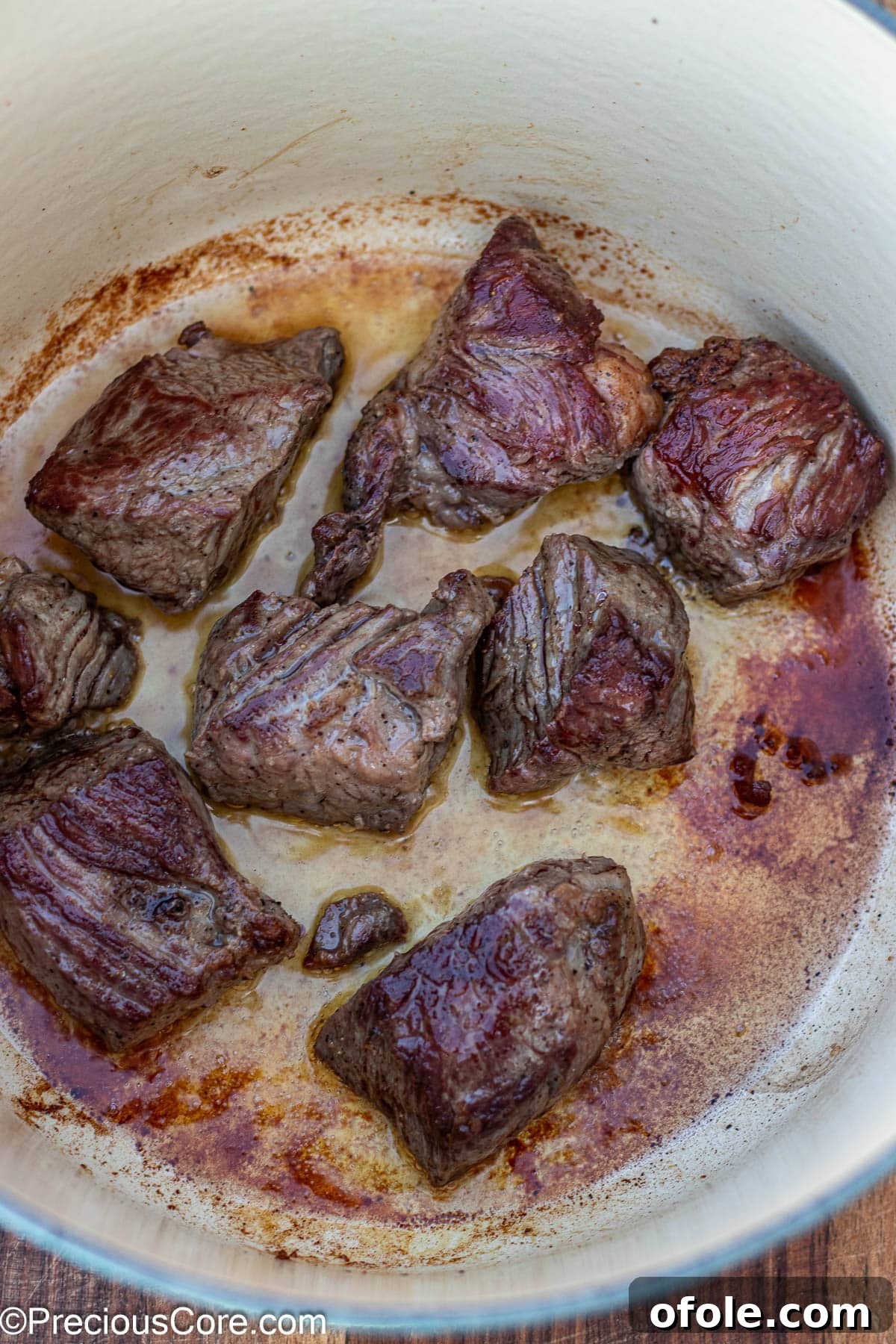 Wine-Free Beef Stew 7 Beef browning beautifully in a Dutch oven, creating a rich base for the stew.