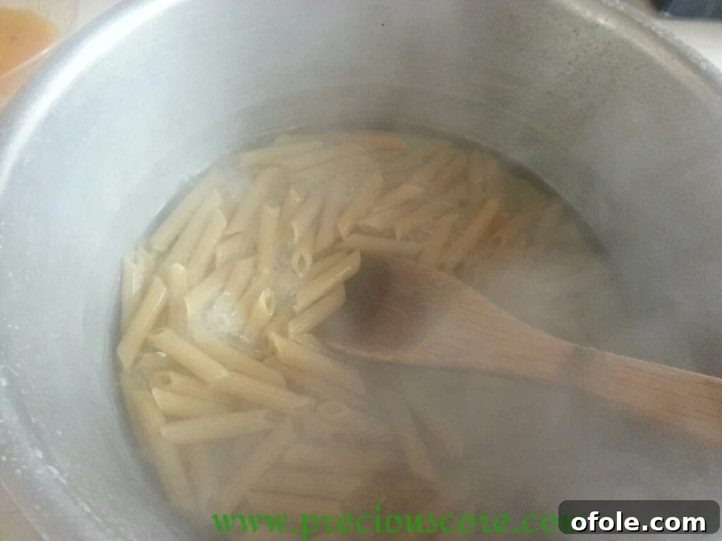 Cooked whole wheat macaroni in a pot