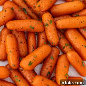 Glazed carrots on a plate, ready to serve, showing the rich glaze.