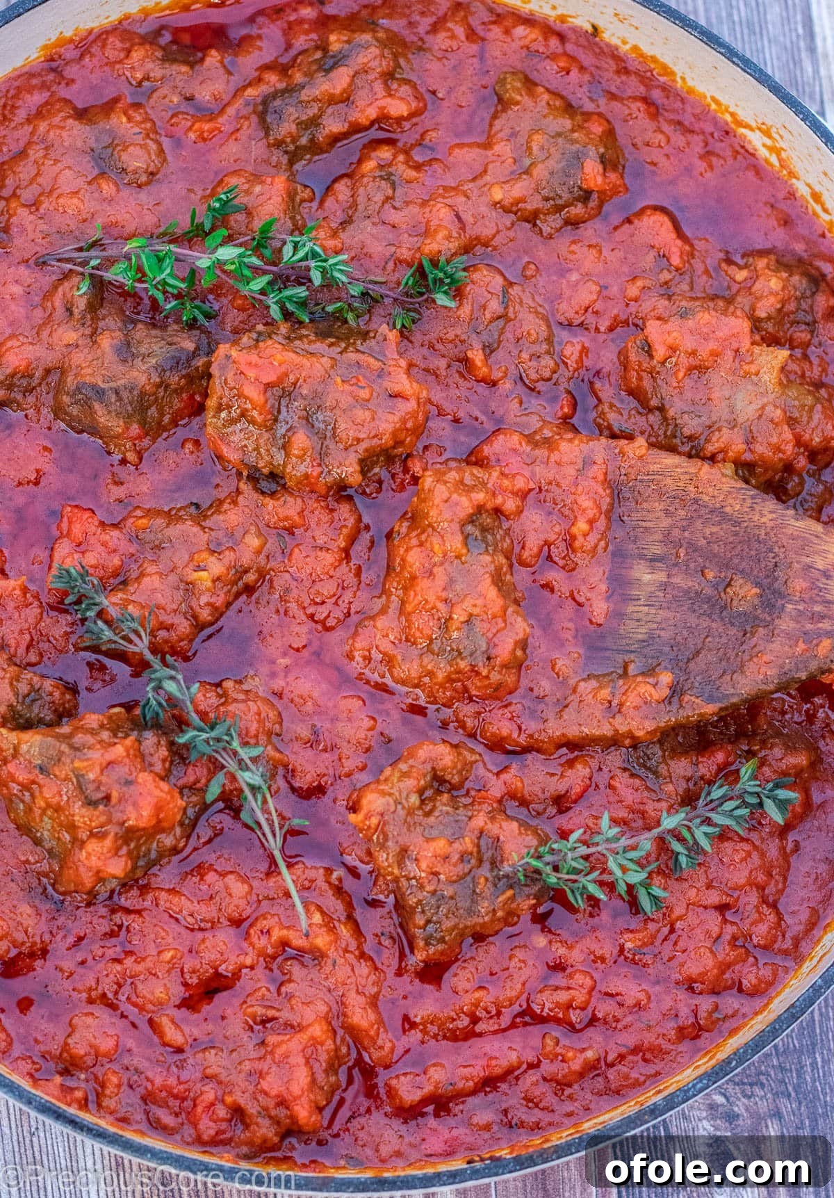 Soulful Nigerian Beef Stew 2 Big pot of rich red Nigerian Beef Stew, brimming with tender beef chunks and a vibrant tomato base.