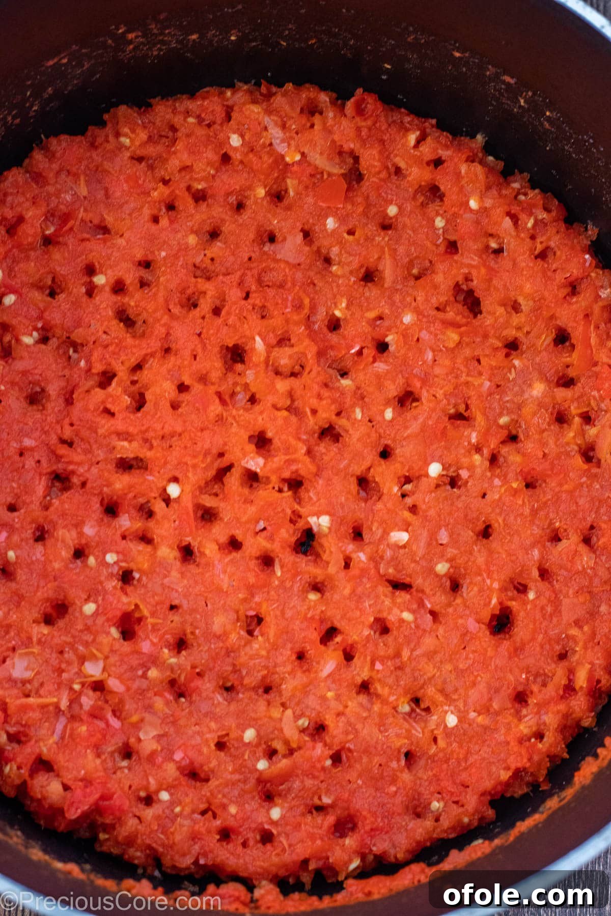 Soulful Nigerian Beef Stew 7 A pot of vibrant tomato-pepper-onion blend, simmering and reducing to concentrate flavors.