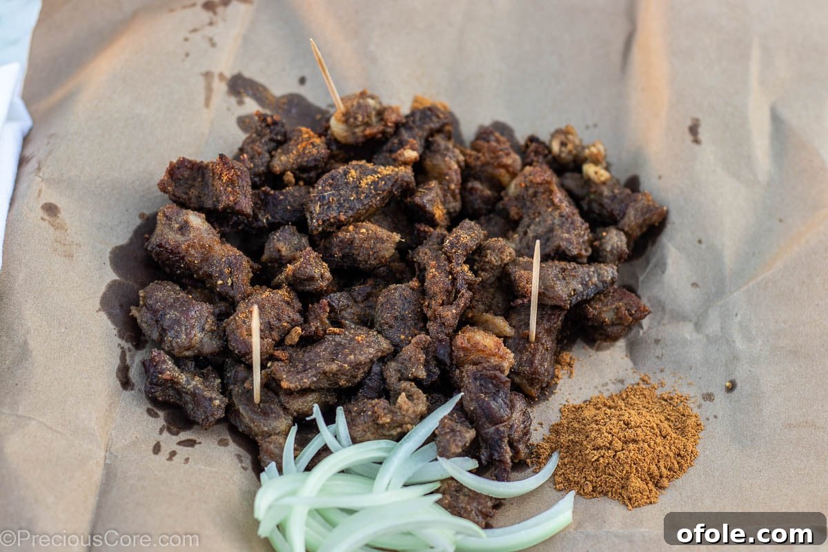 Cameroonian Soya Snack 9 Perfectly cooked Soya, served simply on brown parchment paper, ready to be enjoyed.