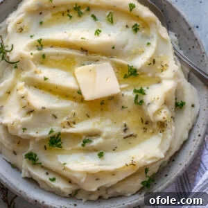 Square image of rosemary garlic mashed potatoes.
