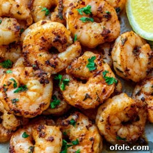 Pan Seared Shrimp on a plate, beautifully plated and ready to eat.