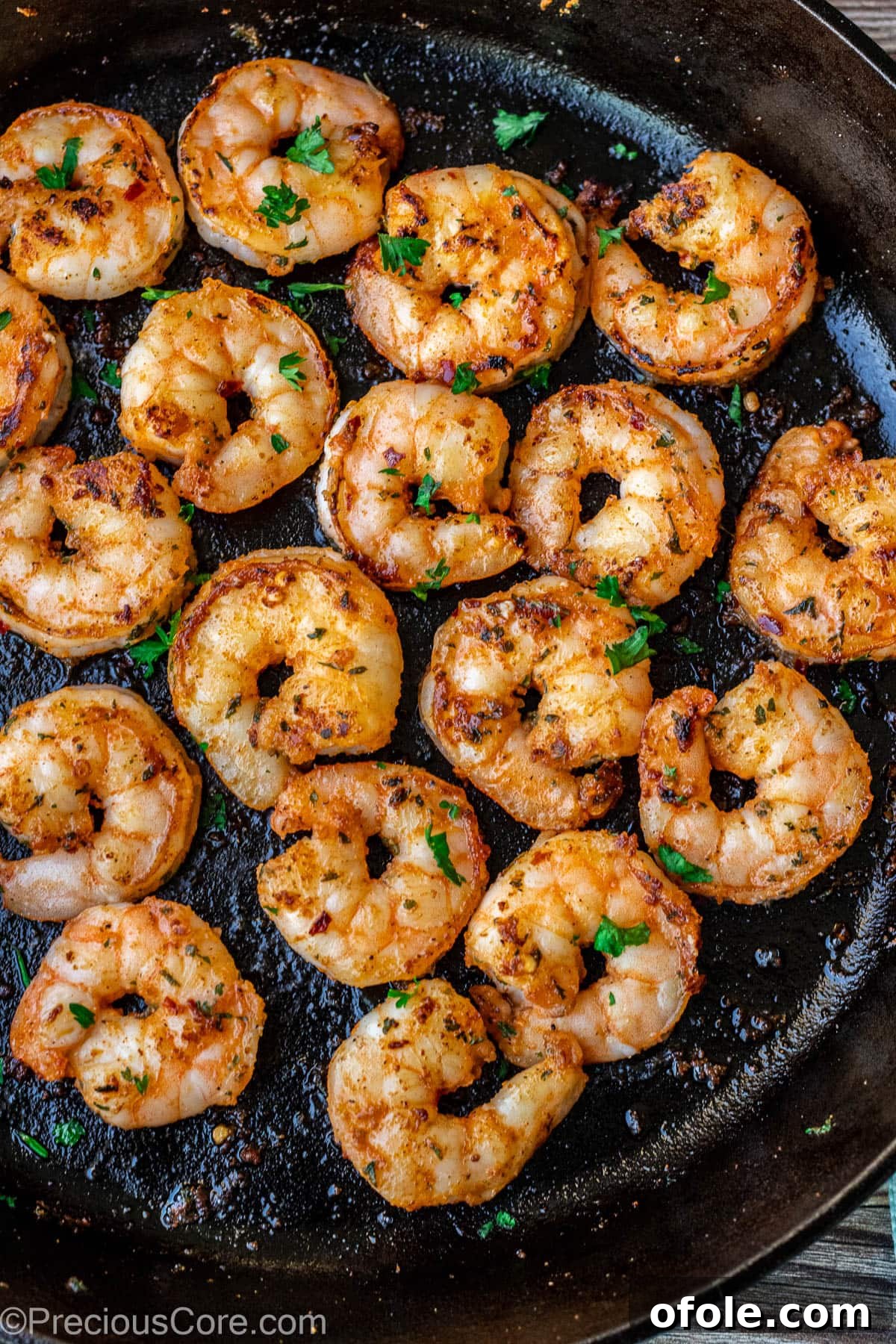 Perfectly pan-seared shrimp in a skillet, ready to be served.