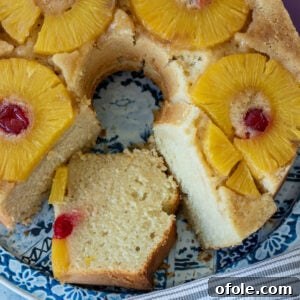 Square image of a delightful Pineapple Upside Down Pound Cake, perfectly baked.