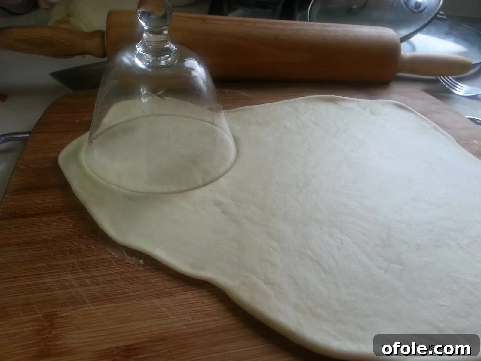 Dough rolled out and cut into circles for fish pies