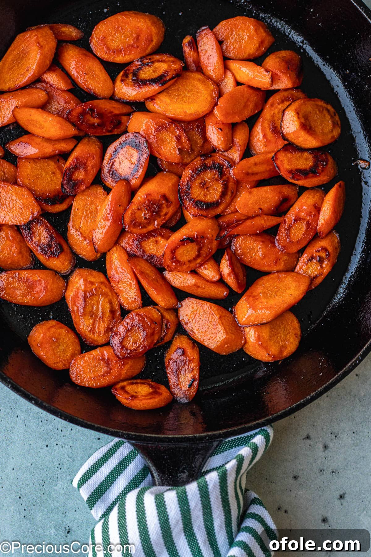Caramelized Carrots 6 Cooked Fried Carrots in a Skillet.