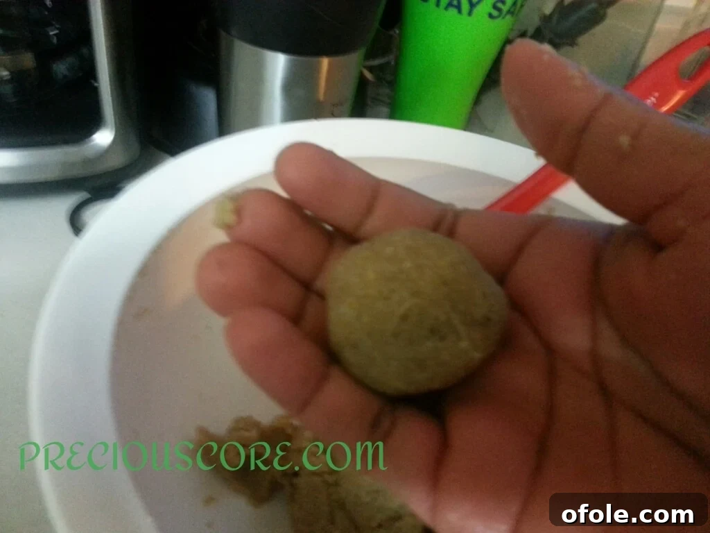 Accra Banana fritters frying in hot oil