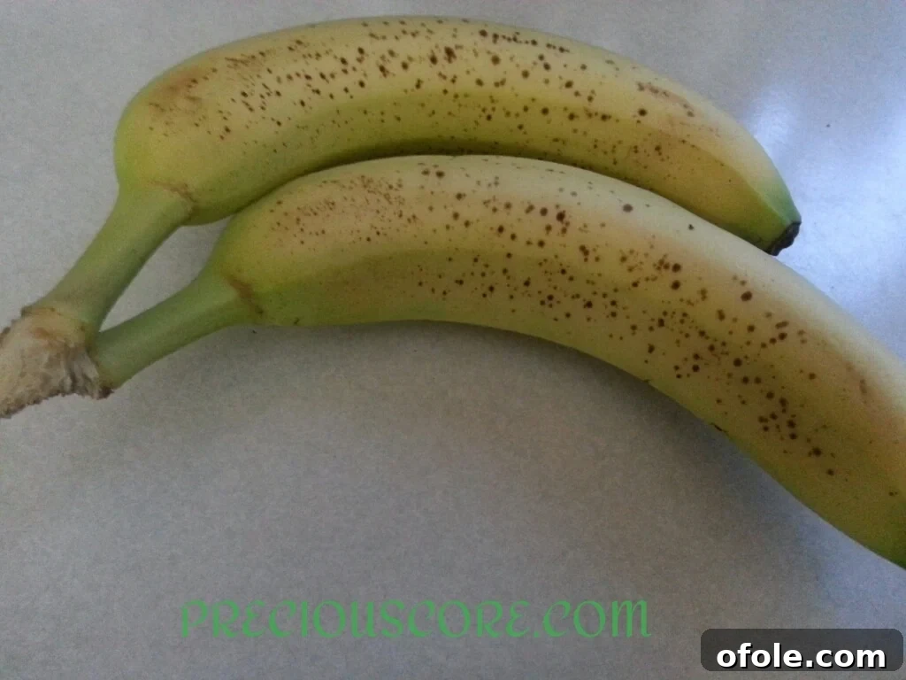 Perfectly ripe bananas with dark spots, ideal for fritters