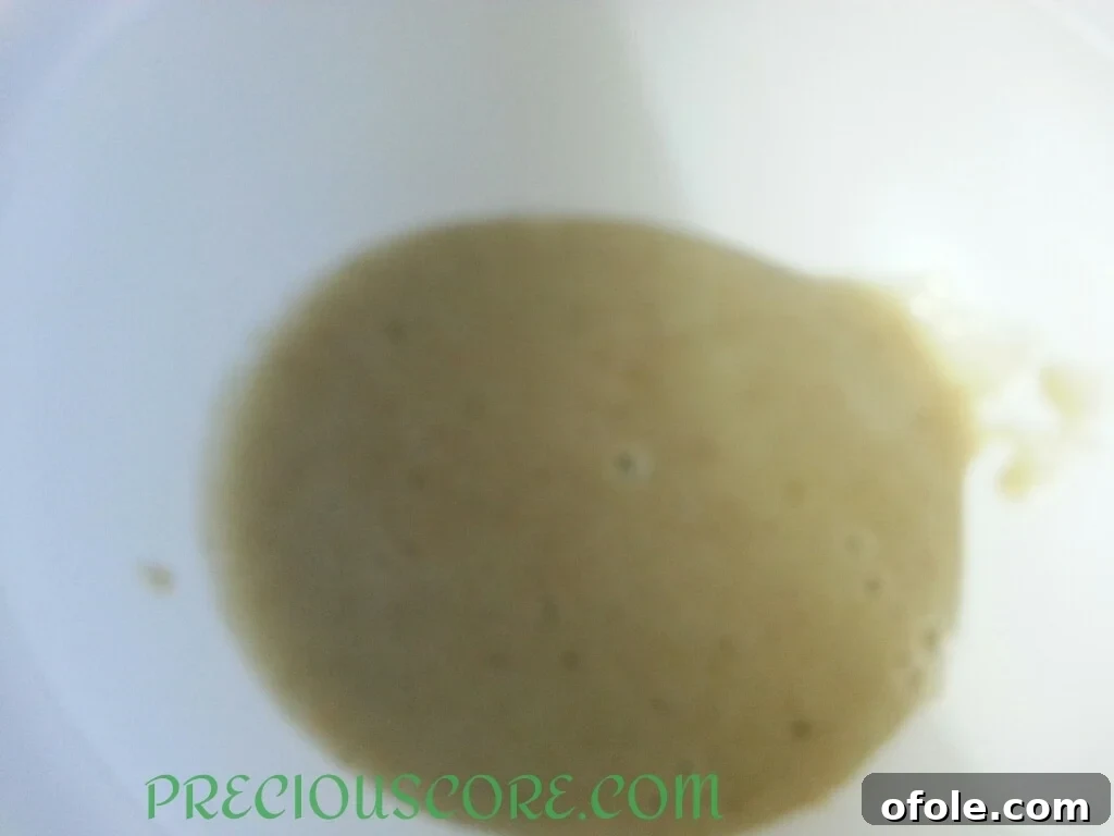Blended banana paste in a mixing bowl