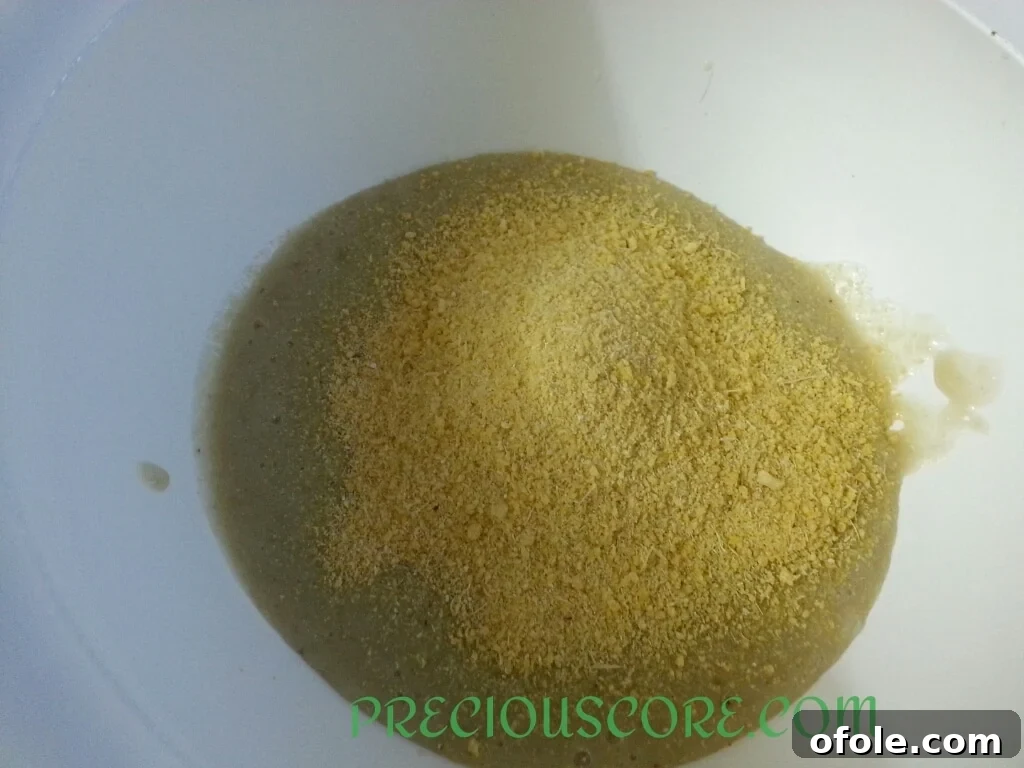 Garri and salt added to the banana mixture