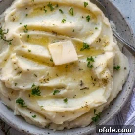 Square image of rosemary garlic mashed potatoes.