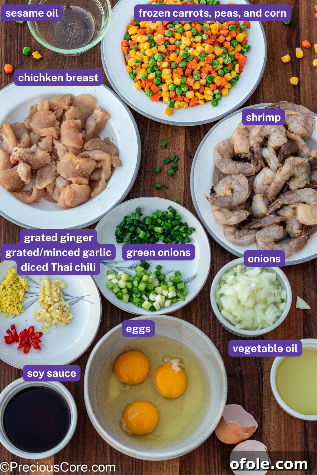 Signature Surf & Turf Fried Rice 5 Assorted fresh ingredients for fried rice with labels.