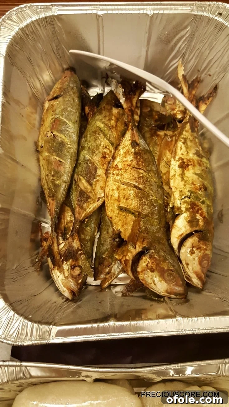 Meeting Digest 7 Perfectly grilled mackerel fish, generously spiced and oven-cooked to flaky tenderness.