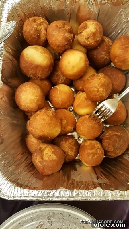 Meeting Digest 9 A plate of golden-brown Cameroonian gateau, delicious and addictive fried dough balls.