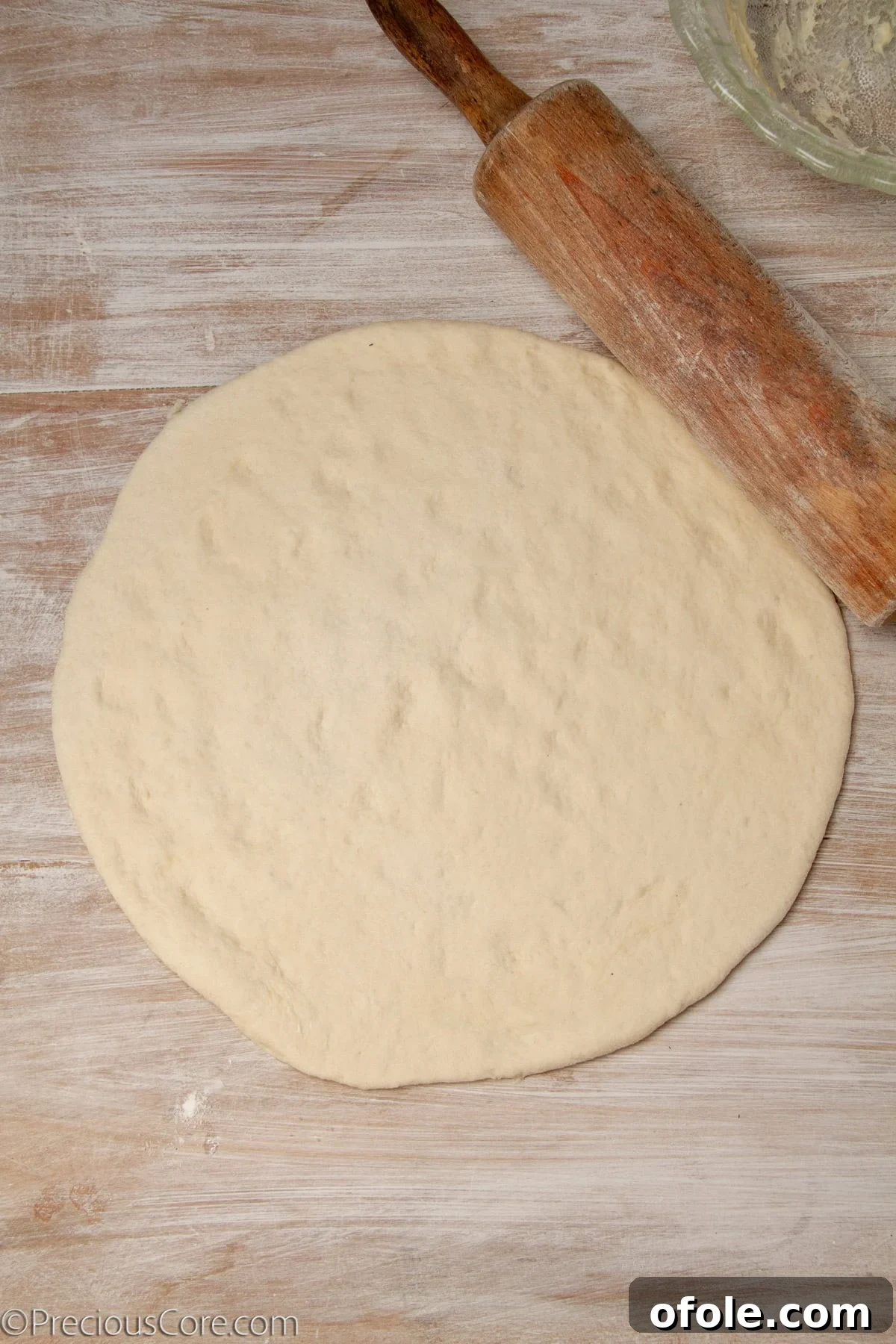 Gourmet Mushroom Pizza at Home 13 Pizza dough rolled out to form a large circle.
