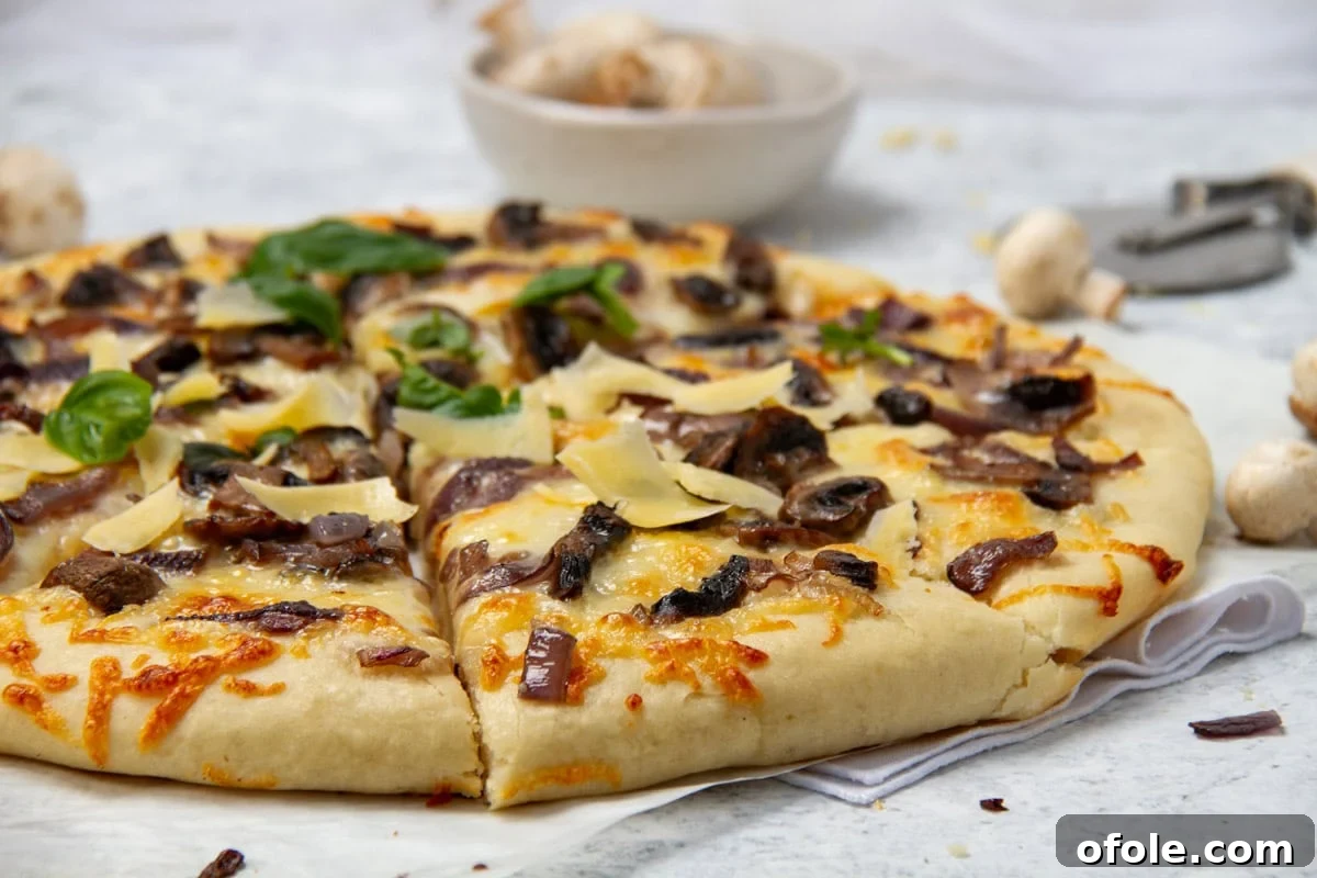Gourmet Mushroom Pizza at Home 16 Landscape image of pizza.