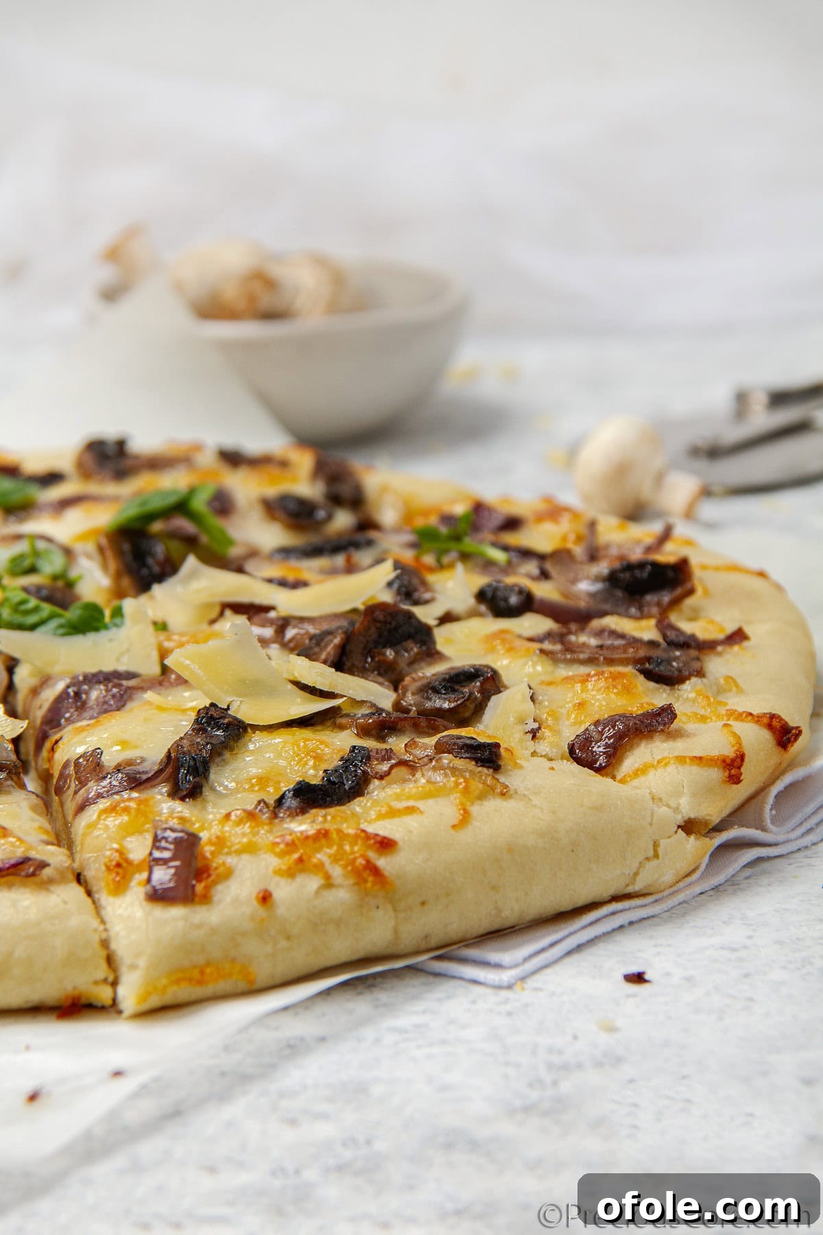 Homemade Mushroom Pizza Perfection 5 Close-up of freshly chopped button mushrooms and sliced onions, ready for sautéing and pizza topping.