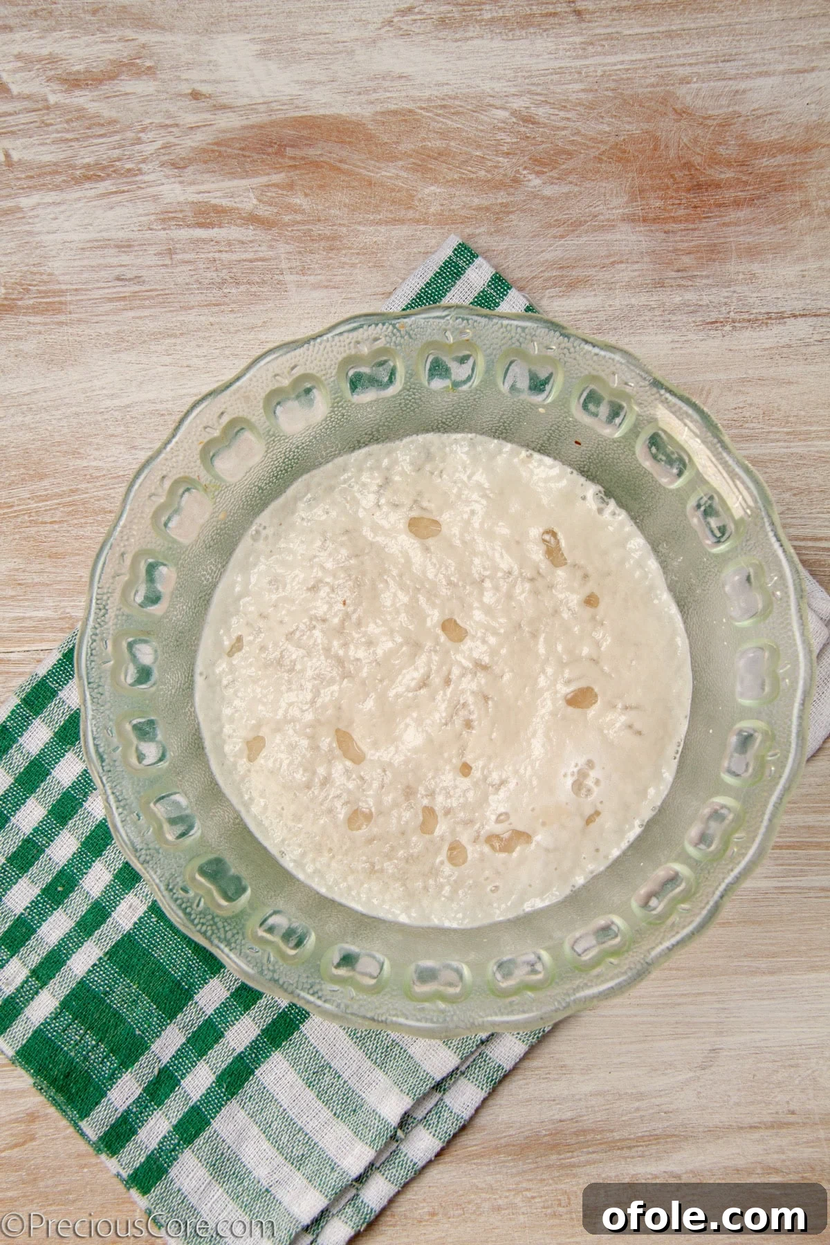 Gourmet Mushroom Pizza at Home 7 Frothy water and yeast mixture in a bowl.