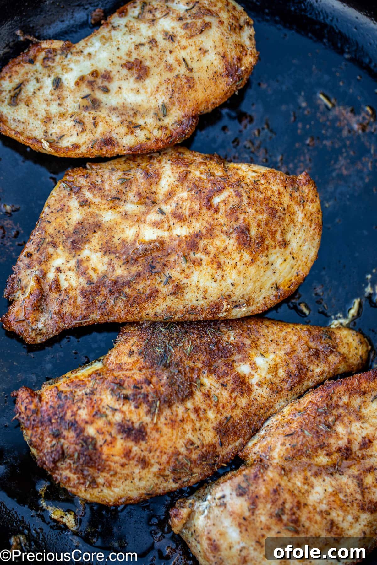 Silenced Poultry Filets 9 Seared thin sliced chicken breasts in skillet.