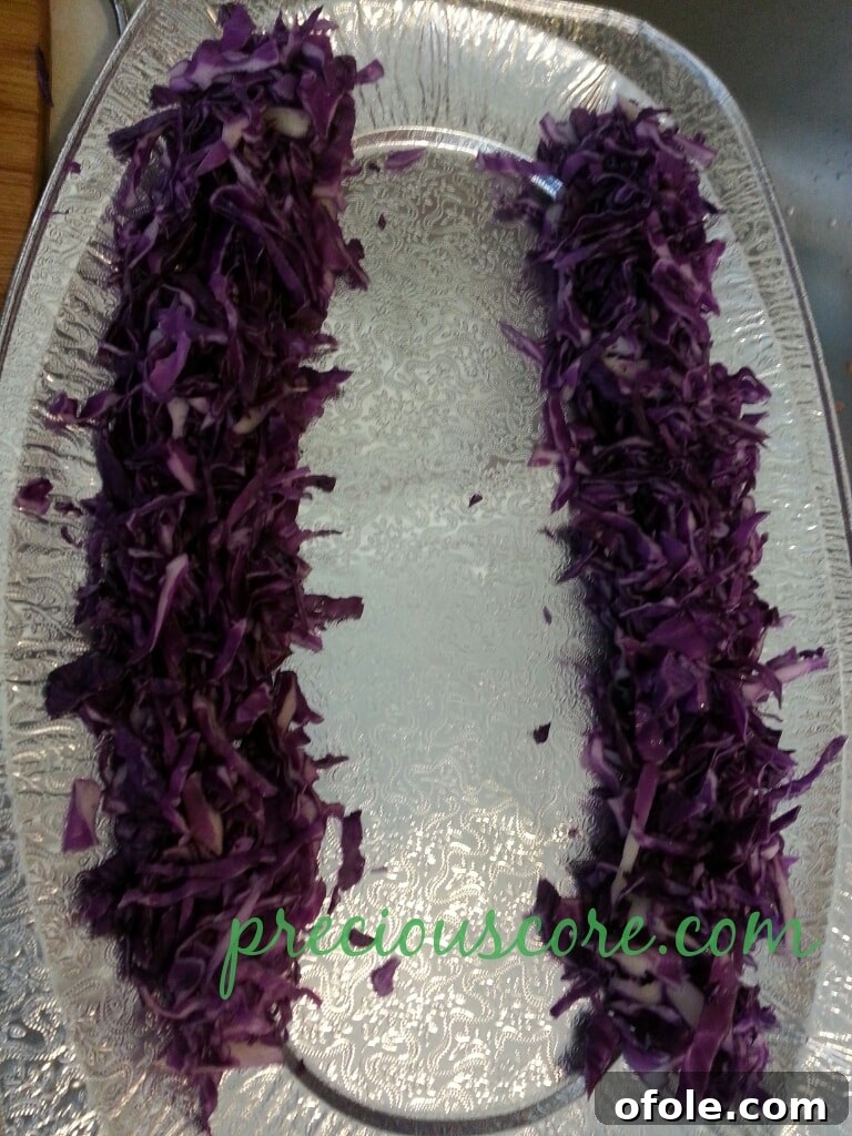 Vibrant Cameroon Salad with Authentic Dressing 3 Finely shredded white cabbage ready for the salad.