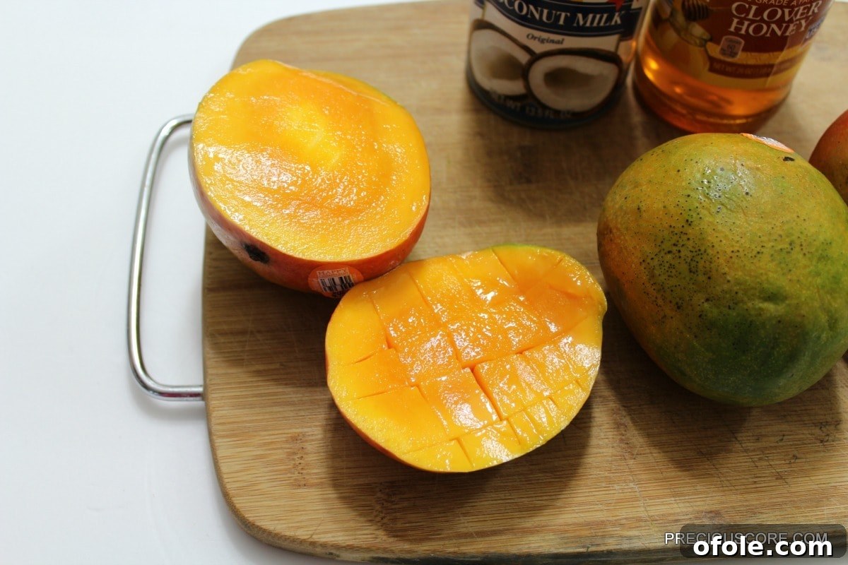 Half a mango scored into dices